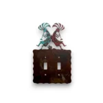 Kokopelli on a metal double switch cover