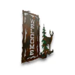 side view and-painted 3D metal welcome wall art with whitetail deer, evergreen tree, rustic welcome sign, and woodland cabin decor style.