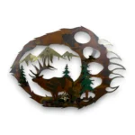 Hand-painted 3D metal bear paw wall art with bull elk, mountain peaks, evergreen trees, and rustic cabin wildlife decor.