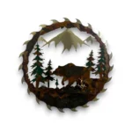 Hand-painted 18 inch 3D metal saw blade wall art with grizzly bear, mountain peaks, evergreen trees, and rustic cabin wildlife decor.