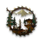 Hand-painted 24 inch 3D metal saw blade wall art with grizzly bear family, mountain peaks, evergreen trees, and rustic cabin wildlife decor.