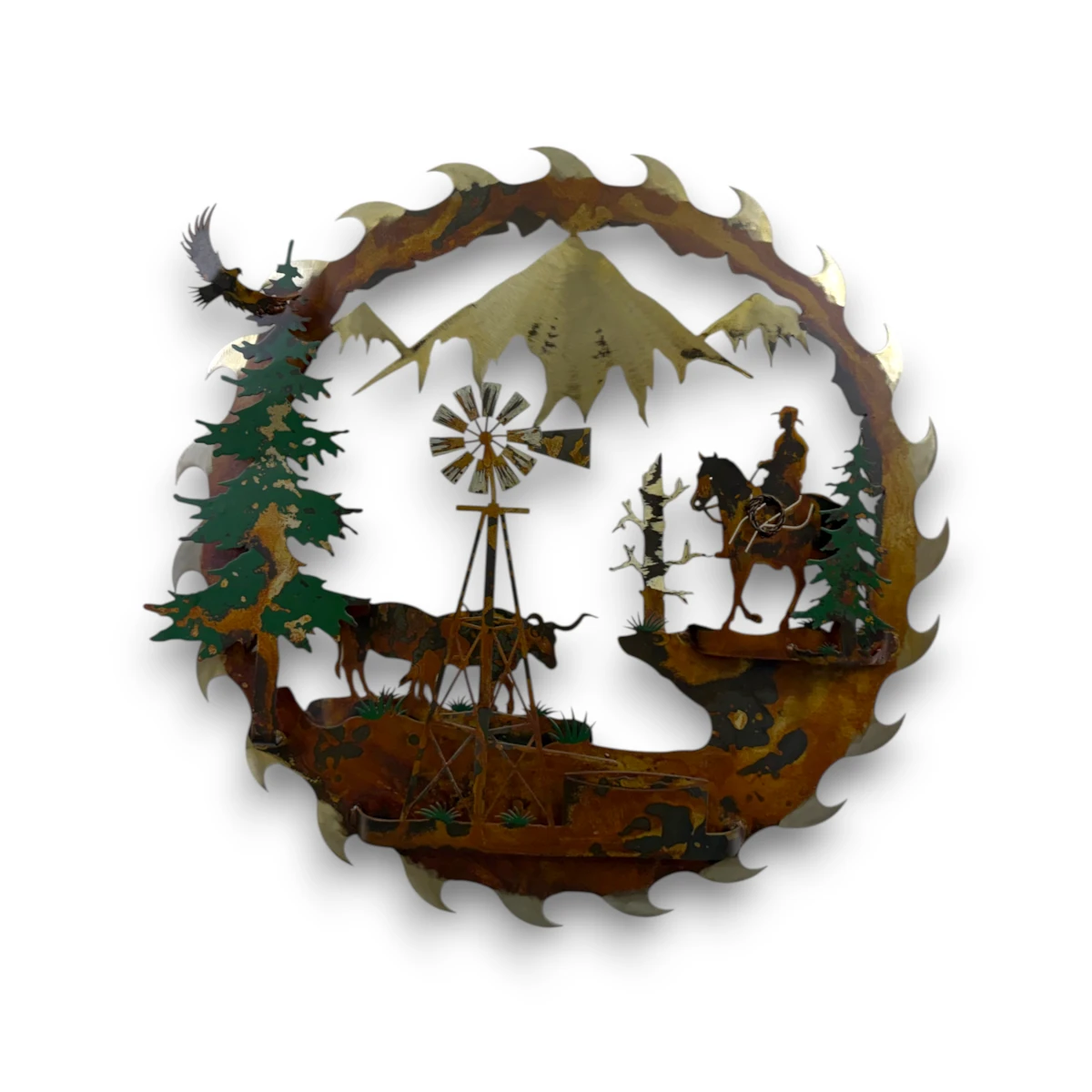 Hand-painted 24 inch 3D metal saw blade wall art with cowboy, cattle, windmill, mountain peaks, evergreen trees, and rustic western ranch decor.