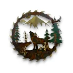 Hand-painted 24 inch 3D metal saw blade wall art with howling wolf, full moon, mountain peaks, evergreen trees, and rustic cabin wildlife decor.