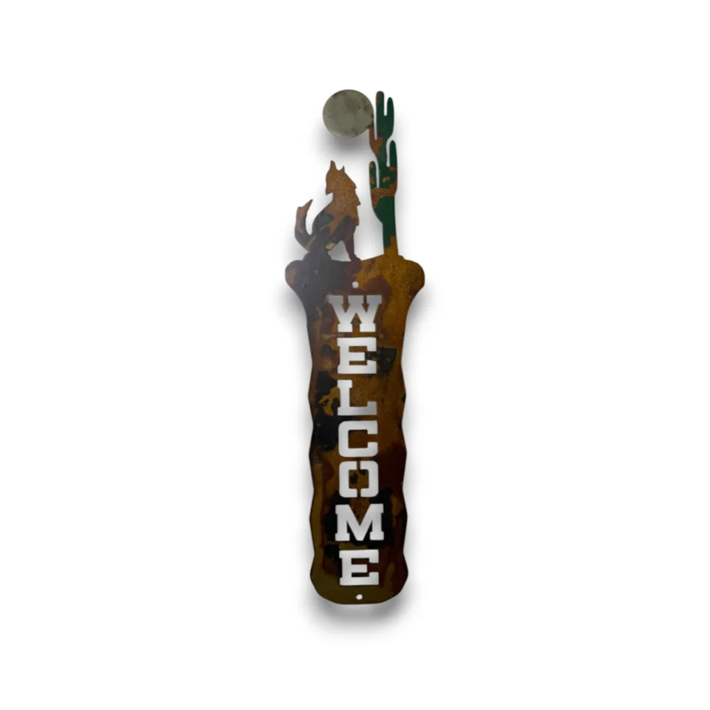 Hand-painted vertical metal welcome sign with wolf, cactus, moon, rustic weathered finish, and Southwestern cabin decor style.