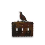 Hand-painted triple toggle metal light switch cover with quail accent, rustic weathered finish, and Southwestern western decor style.