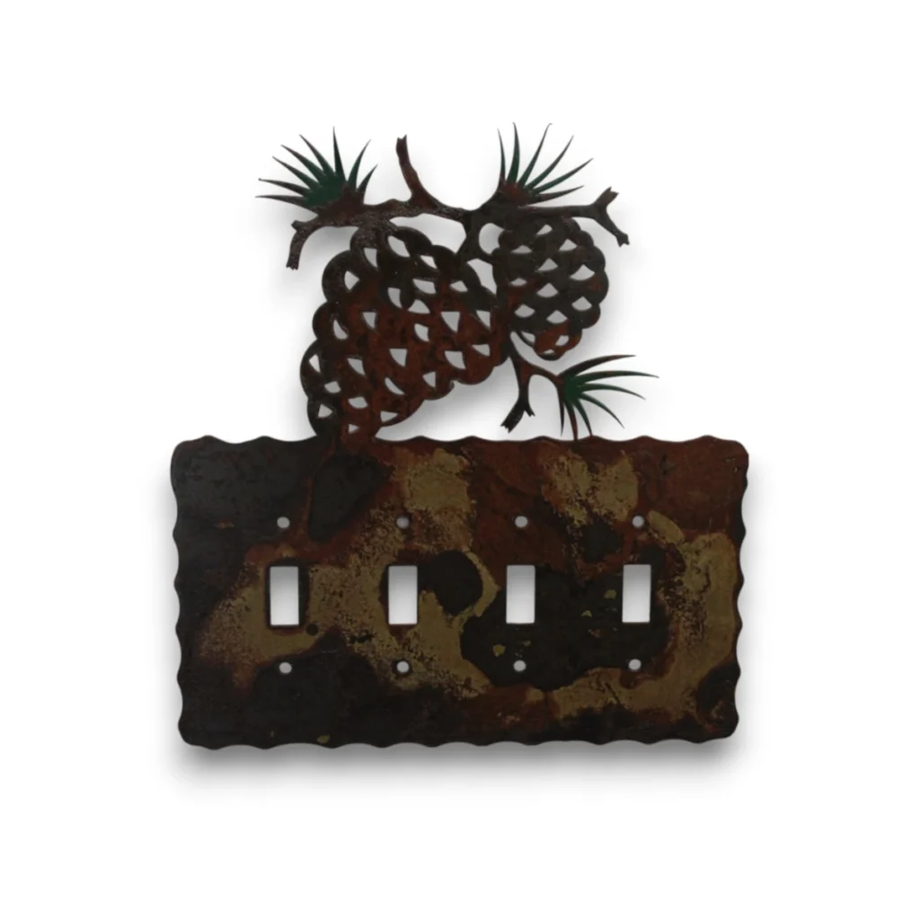 Hand painted quad toggle metal light switch cover featuring pine cones and rustic evergreen branches.