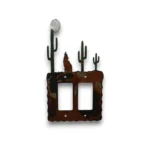 Hand painted double rocker metal light switch cover featuring a howling wolf, moon, and desert cactus scene.