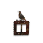 Hand painted double rocker metal light switch cover featuring a rustic quail silhouette.