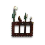 Hand-painted wolf triple rocker light switch cover with cactus, moon detail, rustic weathered finish, and Southwestern decor style.