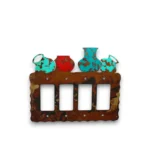Hand-painted pottery quad rocker light switch cover with turquoise and red accents, rustic finish, and Southwestern decor style.